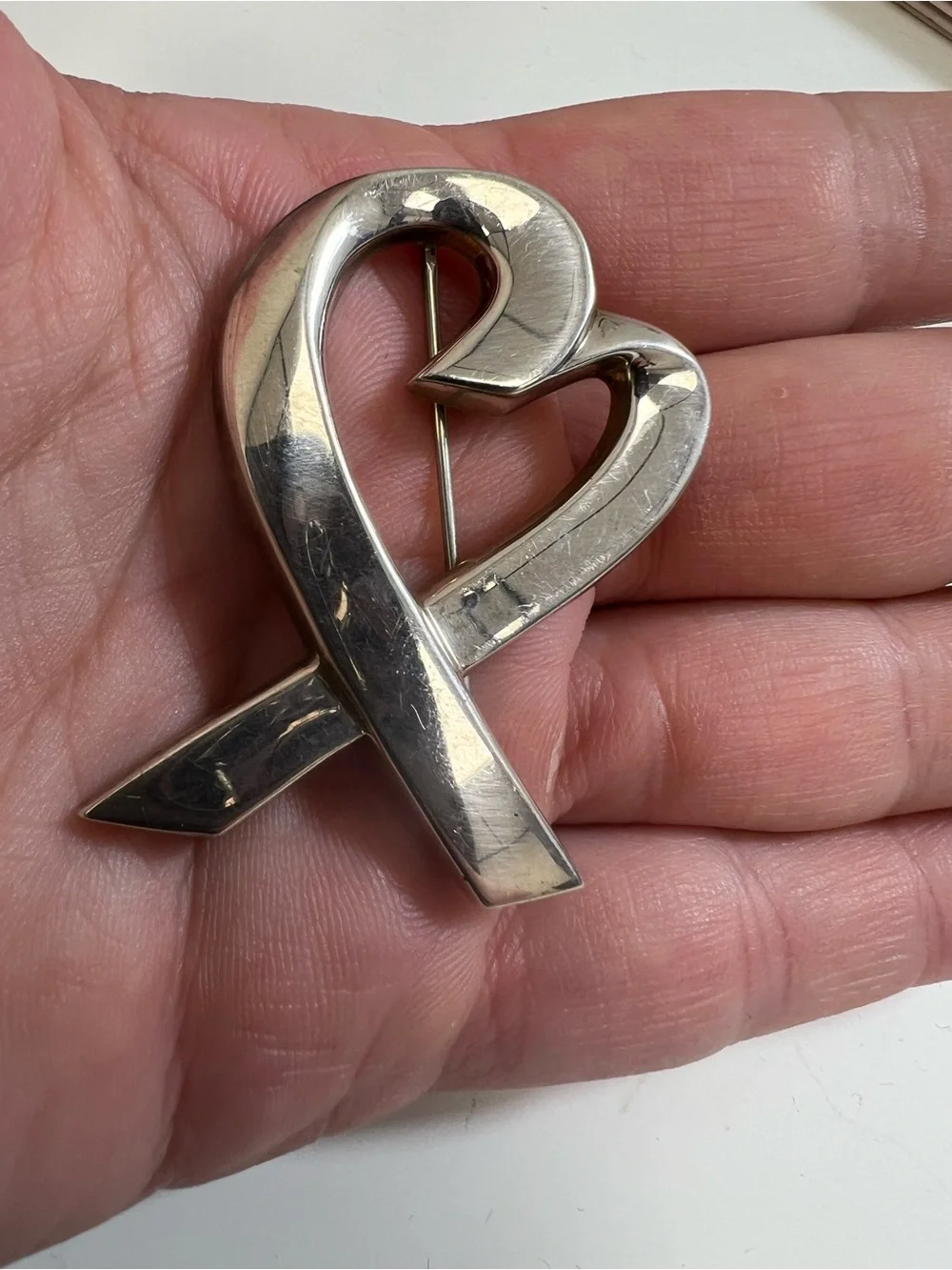 Tiffany & Co. Paloma Picasso Loving Heart Brooch in polished sterling silver